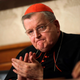 In this Sept. 6, 2018 file photo, Cardinal Raymond Burke applauds during a press conference at the Italian Senate in Rome.